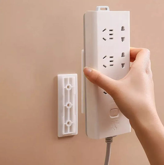 Nástenný držiak na elektrickú pásku